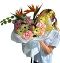 Tropical Dreams - Bird of Paradise, French roses, Carnations, Herbert’s, Bells of Ireland, Oncidium
