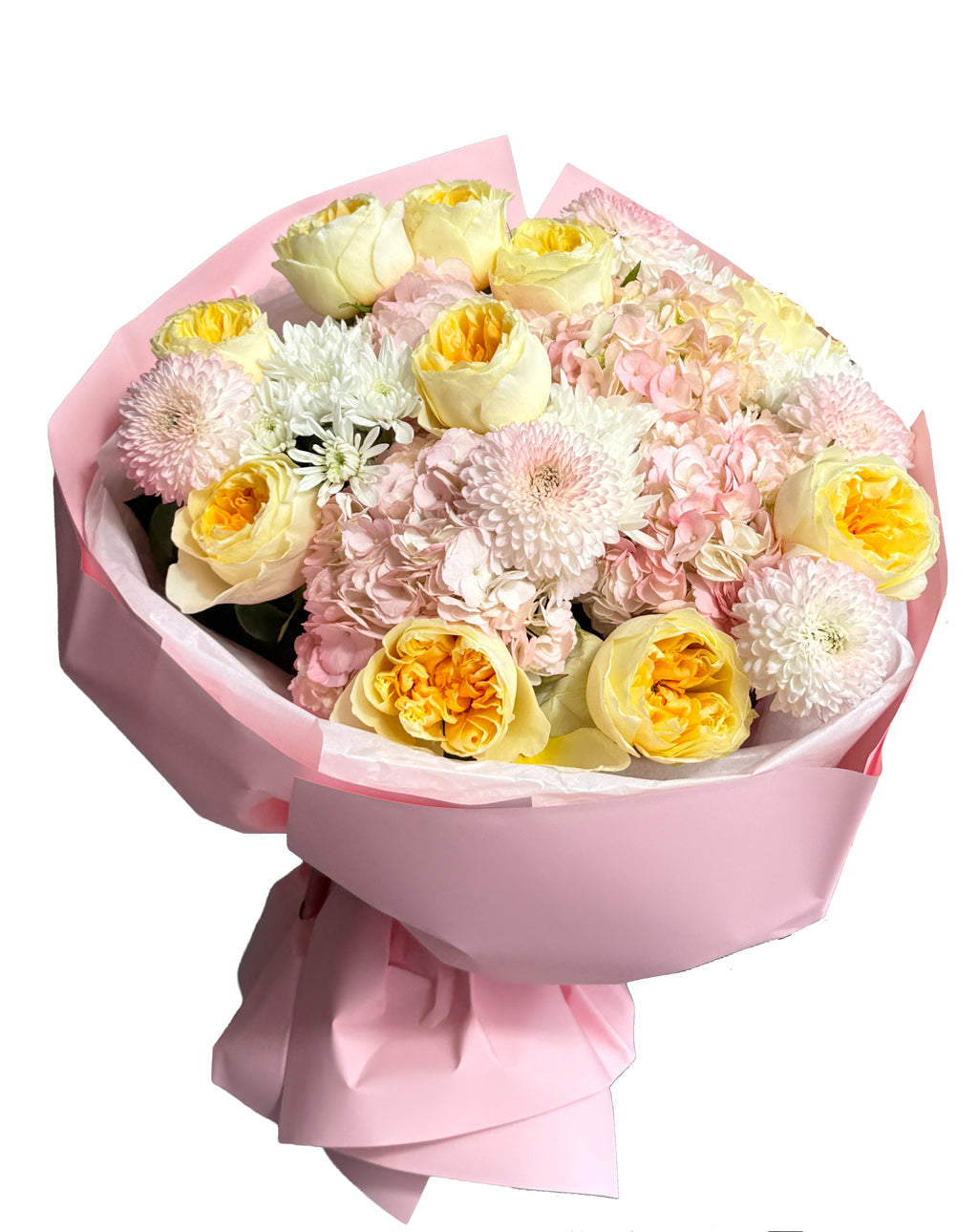 Bouquet of flowers wrapped in pink paper on a white background