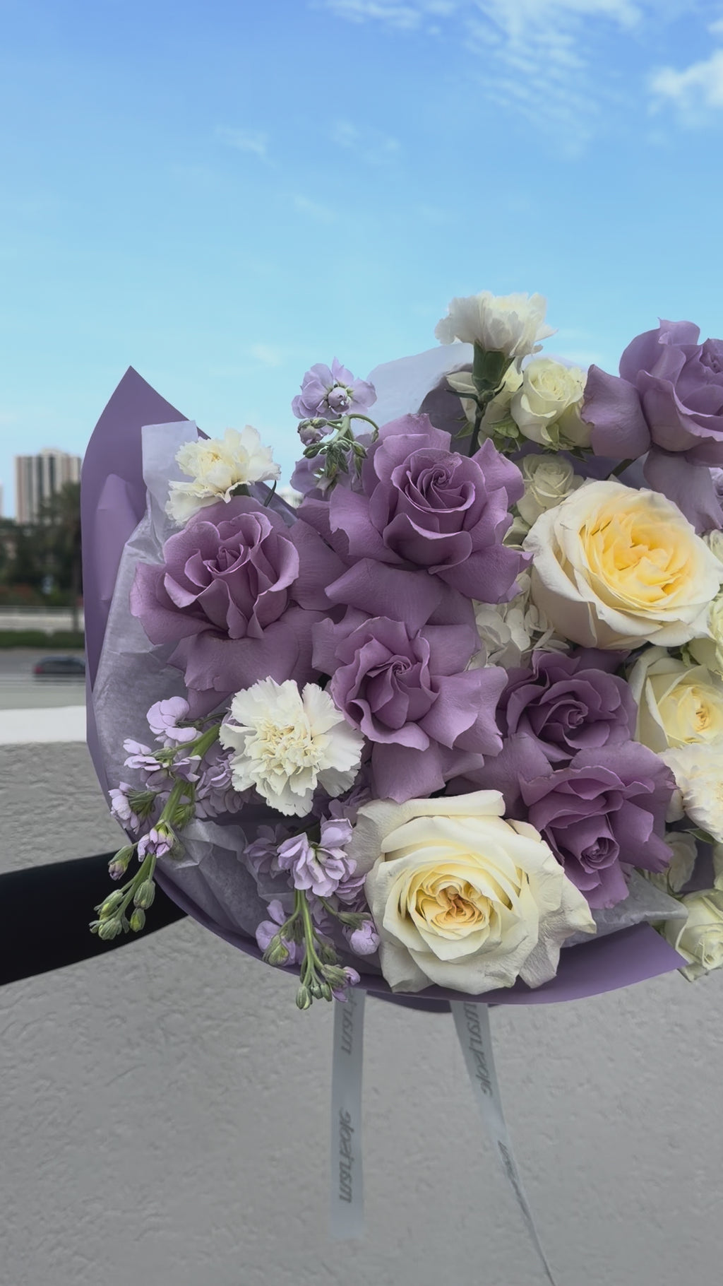 Video of the Purple Secret bouquet with soft lavender and ivory blooms, hand-arranged in Marisole Flower Studio style.