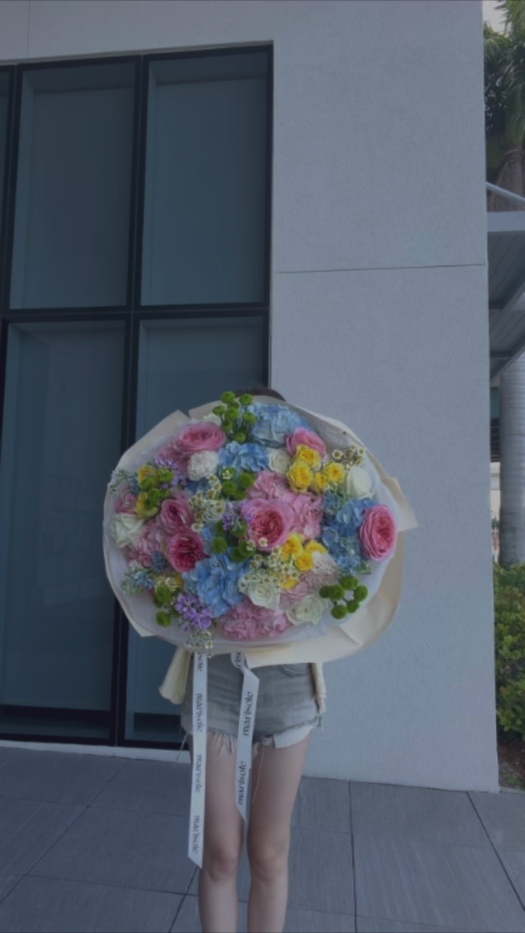 Video of Unicorn Bouquet featuring pastel garden roses, hydrangeas, spray roses, chrysanthemums, stock, carnations, chamomile, and tweedia.