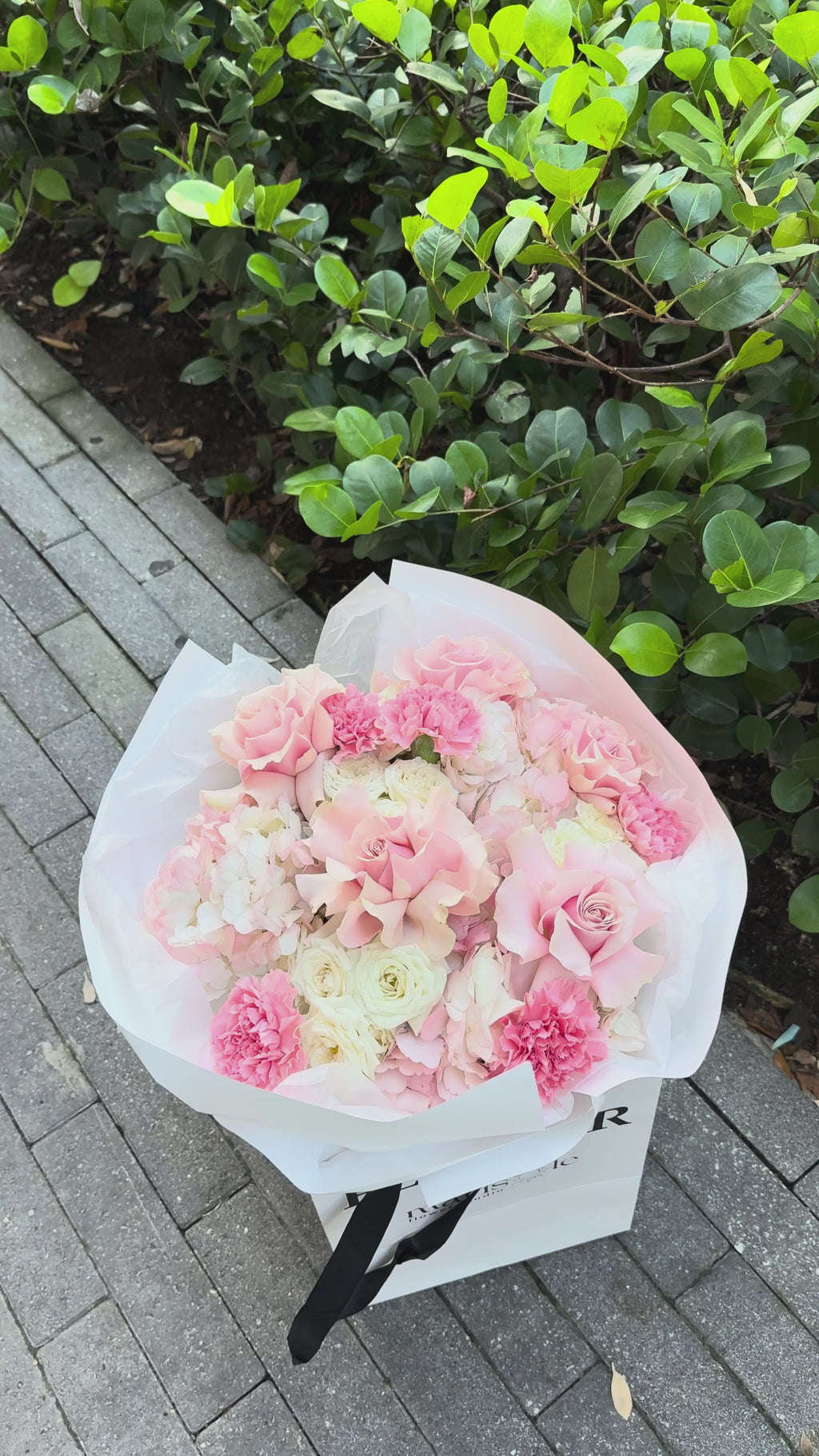 Order the Pink Cloud floral arrangement with hydrangeas and French roses. Elegant, romantic design with same-day flower delivery in Miami & Aventura.