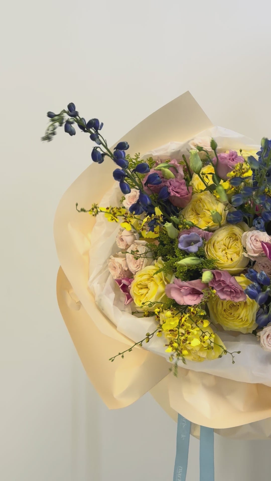 Dopamine Bouquet – Garden Roses, Tulips, Spray Roses, Delphiniums, Dancing Lady Orchids, Eustomas