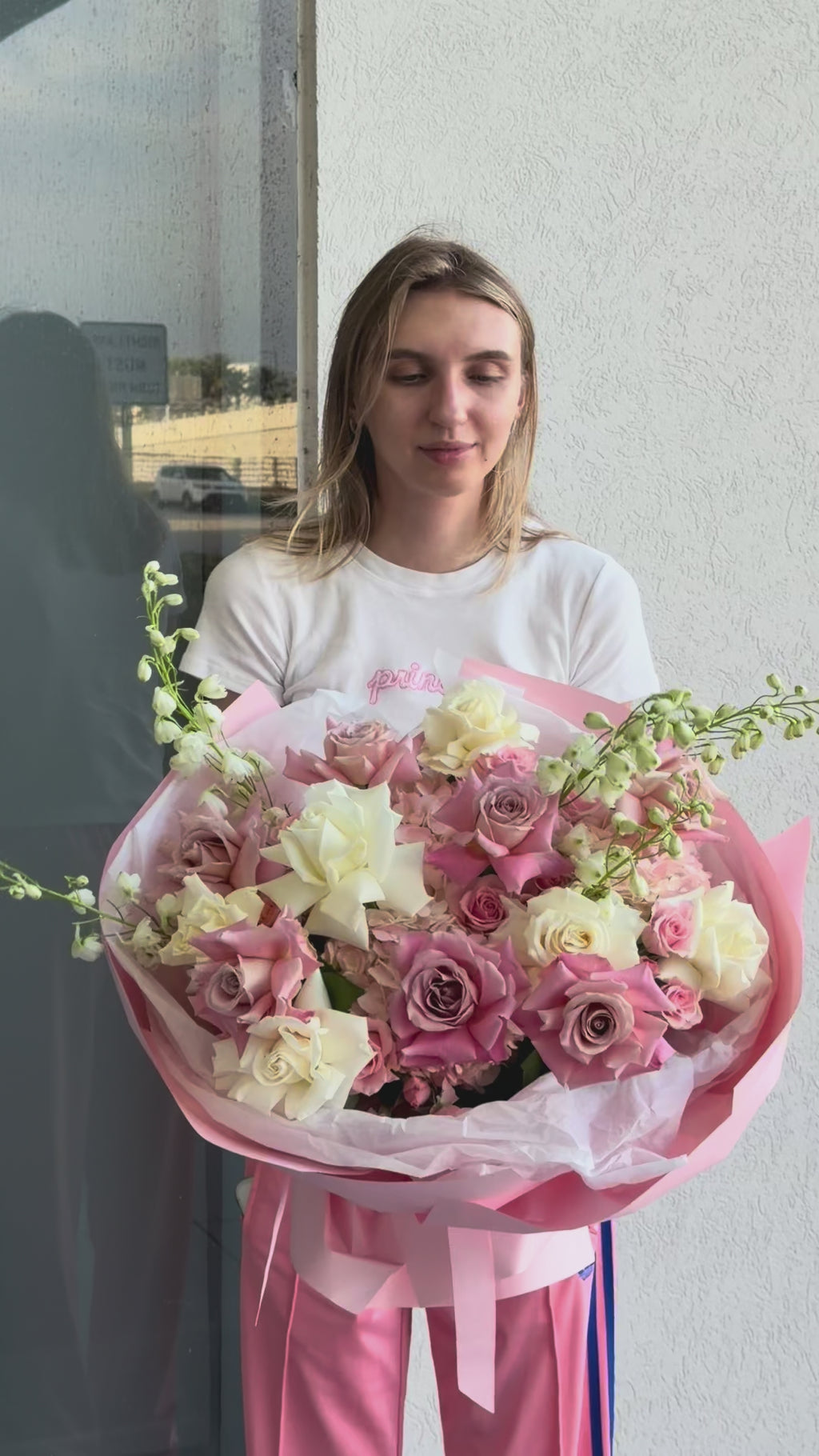 Video of the Pinky Promise Bouquet with French roses, spray roses, hydrangea, and delphinium