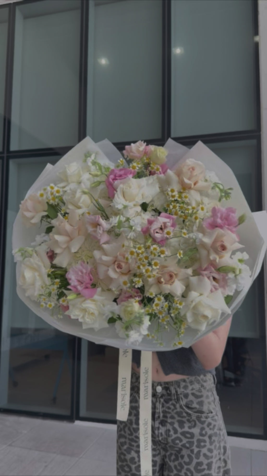 Video of the Rosewood Bouquet with soft pink French roses, hydrangeas, lisianthus, chamomile, and stock.