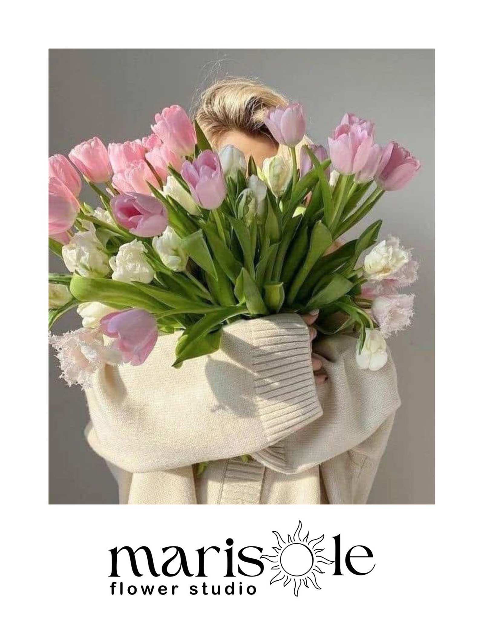 Greeting card with a person holding a bouquet of soft pink and white flowers, featuring Marisole Flower Studio logo.
